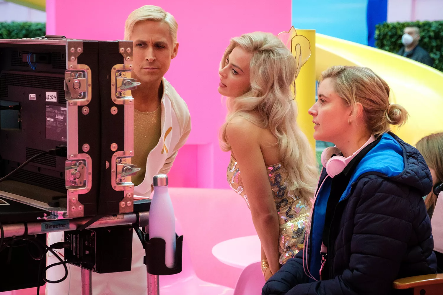 Greta, Ryan and Margot on the set of Barbie.