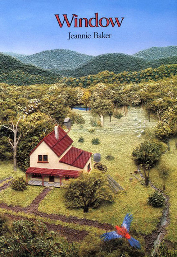 The front cover of Jeannie Baker's "Window", showing a single house surrounded by bushland.