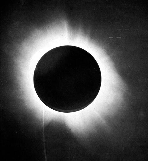 Eclipse photograph from 1919 expedition.

Frank Watson Dyson / Arthur Eddington / Charles Rundle Davidson - F. W. Dyson, A. S. Eddington, and C. Davidson (1920). "A Determination of the Deflection of Light by the Sun's Gravitational Field, from Observations Made at the Total Eclipse of May 29, 1919". Philosophical Transactions of the Royal Society A: 332. ISSN 1364-503X.

From the report of Sir Arthur Eddington on the expedition to verify Albert Einstein's prediction of the bending of light around the sun. In Plate 1 is given a half-tone reproduction of one of the negatives taken with the 4-inch lens at Sobral. This shows the position of the stars, and, as far as possible in a reproduction of this kind, the character of the images, as there has been no retouching. A number of photographic prints have been made and applications for these from astronomers, who wish to assure themselves of the quality of the photographs, will be considered as as far as possible acceded to.