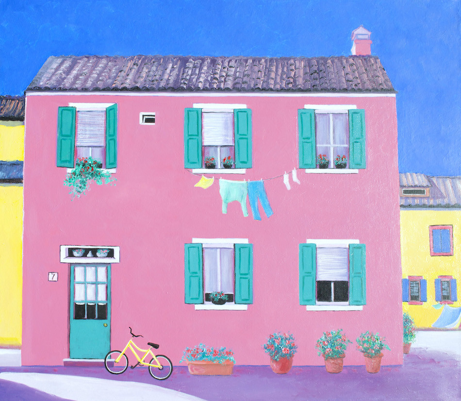 An oil painting of one of the colorful houses on the island of Burano. This house is a brilliant cerise with contrasting green shutters and pot plants. A yellow bicycle leaning against the wall and washing on the line adds some colourful contrast. There are glimpses of yellow houses behind the pink house.