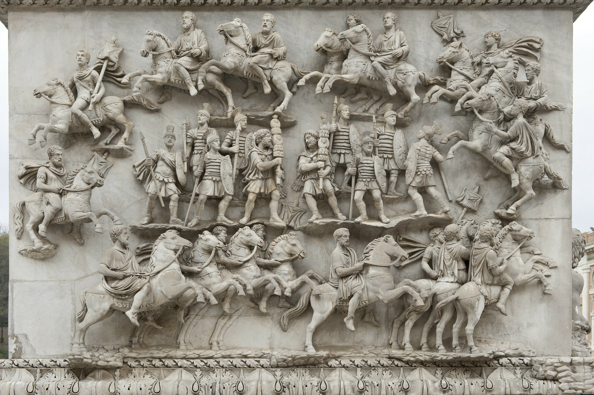 Depiction of the decursio equitum on the base Column of Antoninus Pius. Riders and appear to move in a ring around the praetorian guard at the centre as part of the funerary rites for the emperor and his empress. Photo by Egisto Sani via Flickr