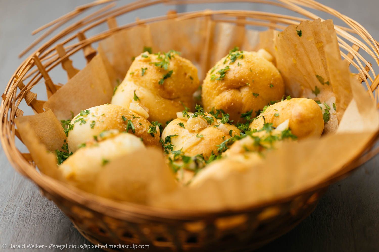 Basket with home made garlic rolls