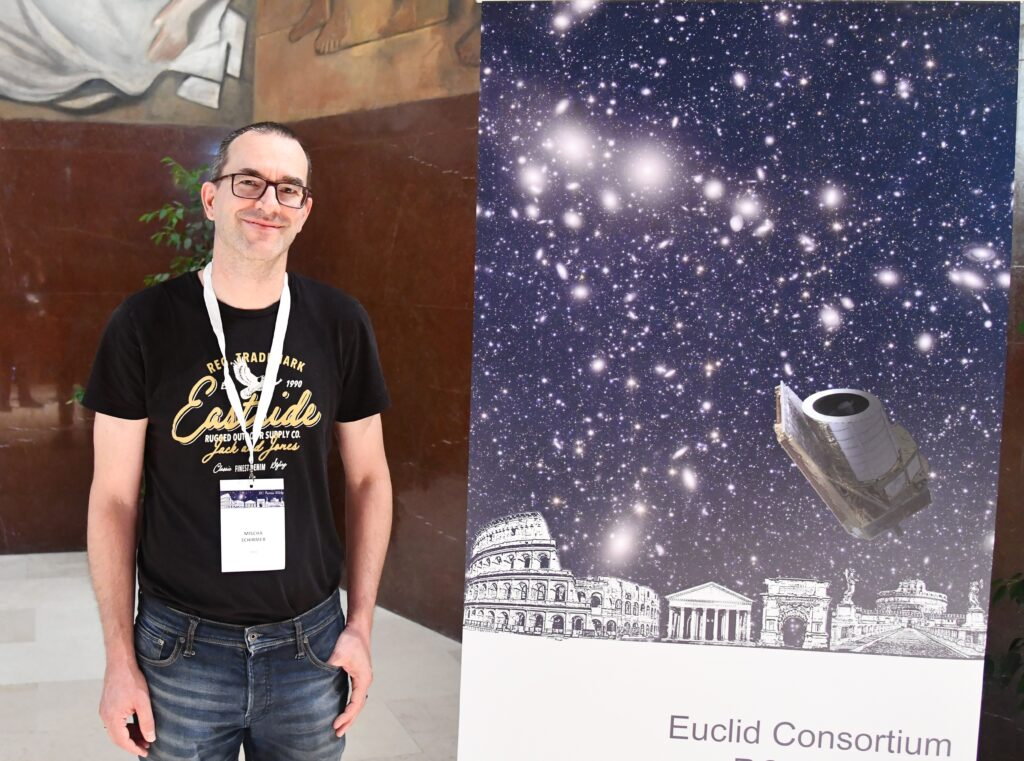 Image of Dr. Mischa Schirmer, Euclid Calibration Scientist, next to an image composite of the Euclid image of the Perseus galaxy cluster, the Euclid spacecraft, and the Collosseum in Rome, city of this year's Euclid Consortium meeting.