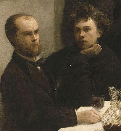 Henri Fantin-Latour, Un coin de table; détail: Verlaine et Rimbaud (1872)
Musée d'Orsay, Paris, France.

The image focuses on Paul Verlaine (left) and Arthur Rimbaud (right), two renowned French poets.

Verlaine has a receding hairline, a beard, and a serious expression. He is dressed in dark formal attire, sitting upright with his hands on the table.

Rimbaud, younger and with wavy, unkempt hair, rests his head on one hand while gazing at the viewer with an intense, somewhat dreamy expression.

The scene is dimly lit, with a muted color palette emphasizing the contrast between the figures and the background.

On the table, there is a glass of wine and a glass decanter, reinforcing the bohemian and intellectual atmosphere.