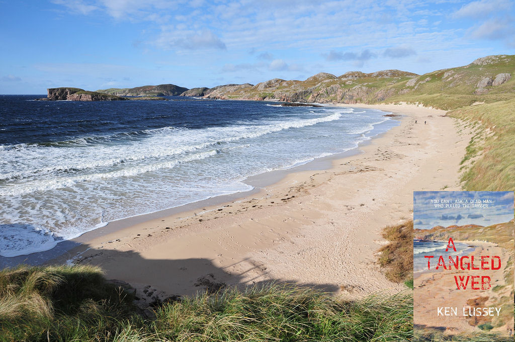 The beach at Oldshoremore. The image shows an extensive length of beach facing to the left out to sea. It has light-coloured sand and is backed by dunes. There is marram grass at the foot of the frame and a headland sweeps to the left beyond the beach, ending in an island. The sea is rough and there are two tiny figures walling along the beach. The scene is in sunlight. The front cover of ‘A Tangled Web’ is shown in the bottom right corner.