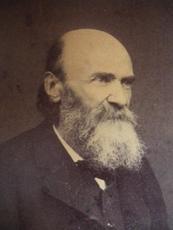 Photo of Amédée Guillemin.

An aged photograph featuring a man sporting a long beard, capturing a timeless style.