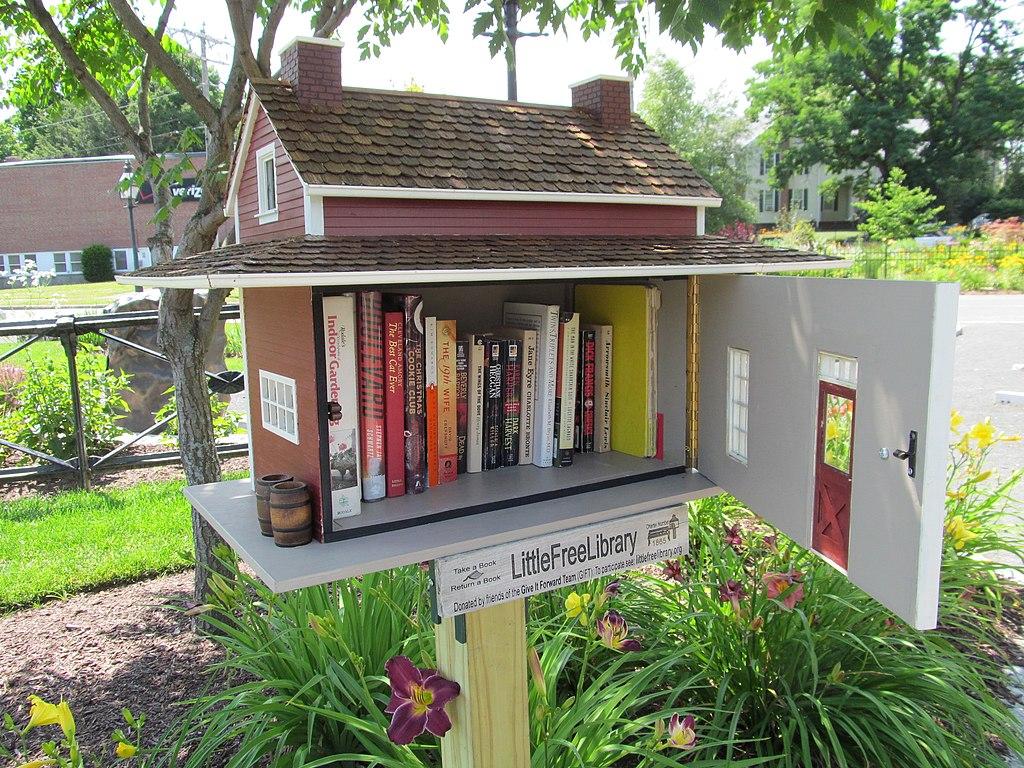 Image of a free little neigboorhood library in Easthampton, MA. A small house, redesigned as book shelf.

Photo by John Phelan, CC BY-SA 3.0 <https://creativecommons.org/licenses/by-sa/3.0>, via Wikimedia Commons