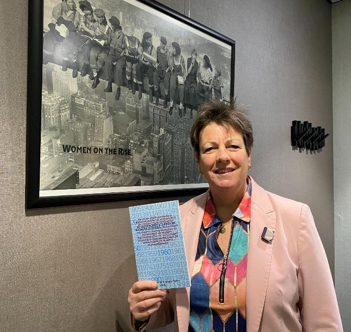 Marjolein Niebier holding book that influenced her