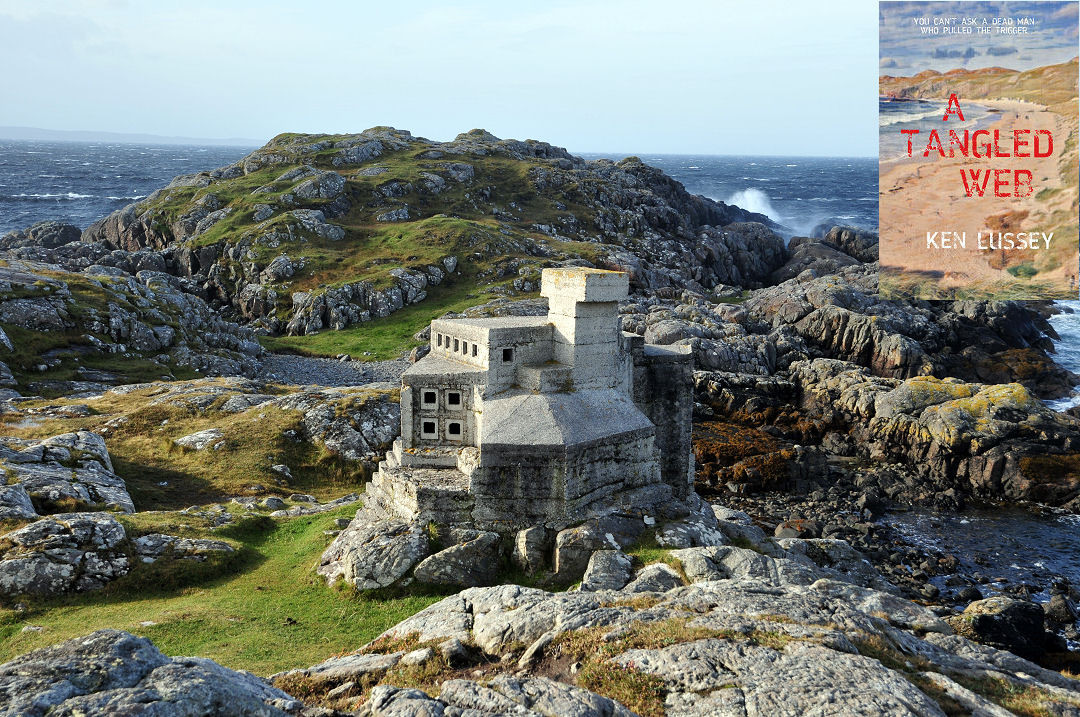 The image shows a view along a rocky promontory with grassy patches and sea on the right and in the background. In the centre of the frame is a light grey concrete structure made up of flat planes and odd angles with a chimney projecting from its centre and small square window holes in several of the surfaces. The light is grey and the sea is rough. The front cover of ‘A Tangled Web’ is shown in the top right corner.