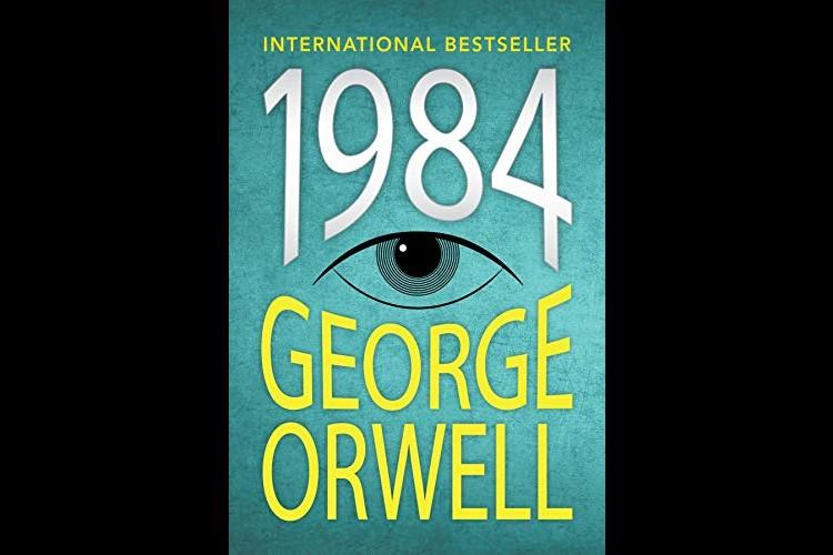 The  cover of the book "1984" by George Orwell.

The author's name is in a Yellow block capital typeface against a blue background.
The title is in white.

There is an illustration of a single eye in black, grey and white between the title and the author.

* Another Duchess of Spring Alt-text production ™