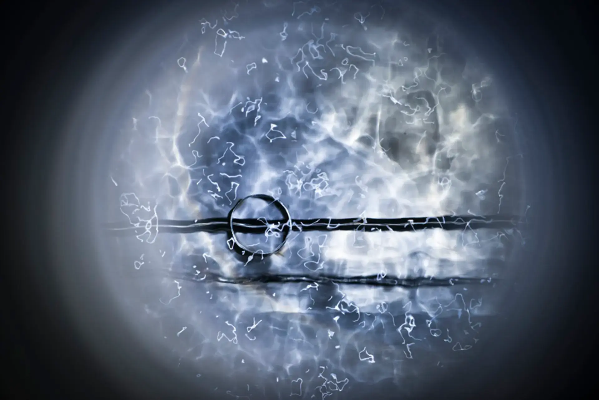 Shimmering liquid argon inside a 35-ton-capacity prototype cryostat used for early tests of LBNF/DUNE. Courtesy Fermilab/Reidar Hahn